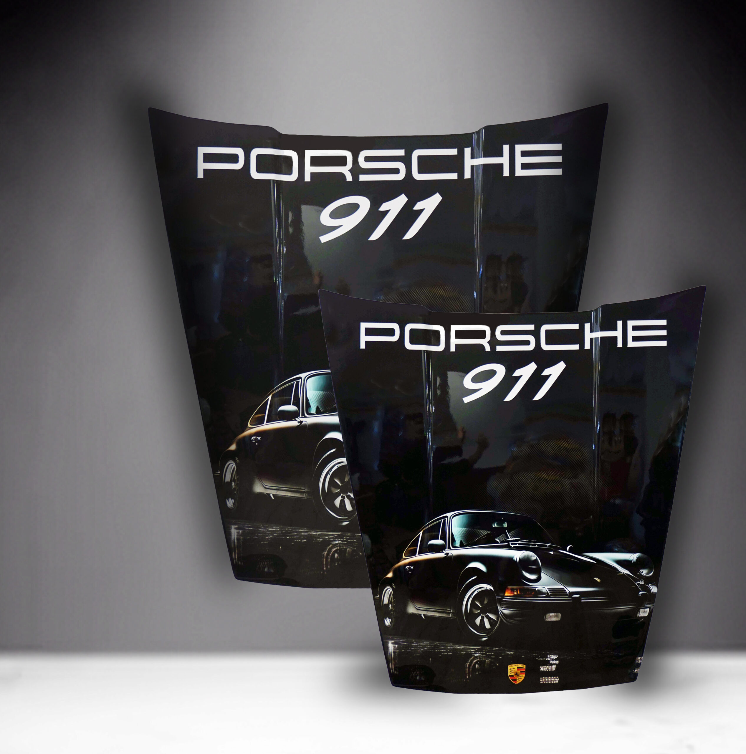 Car Mask 911 - Theme 27 1 Two Porsche 911 car hoods with a sleek black finish, vintage Porsche 911 illustrations, and white