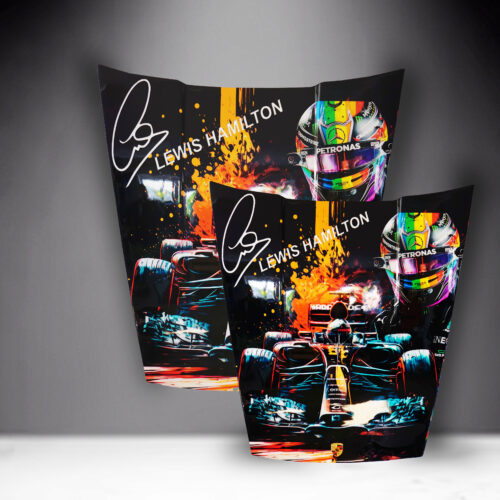 Two racing posters featuring Lewis Hamilton, with his signature, a colorful racing helmet, and an image of his race car with fiery graphic elements.