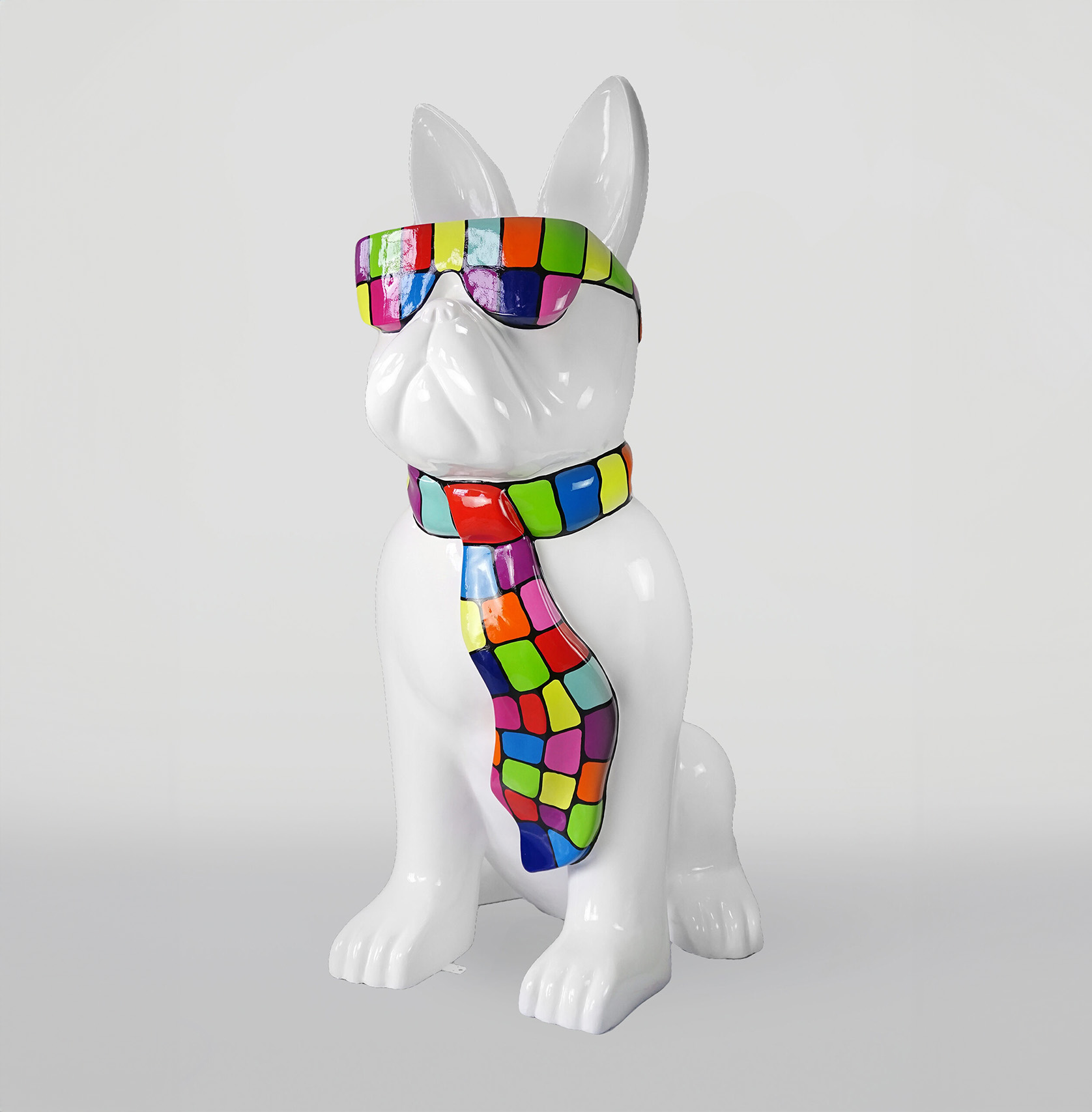 Large figure of a bulldog with a tie and glasses - smartie version 1 White dog statue wearing colorful sunglasses and a matching tie.