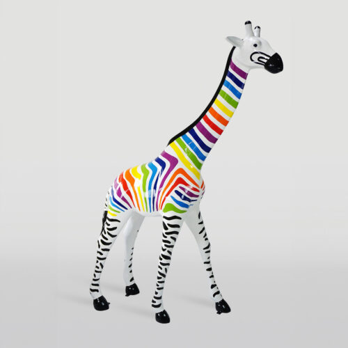 Colorful giraffe sculpture with black and white zebra-striped legs and a rainbow-striped body and neck.