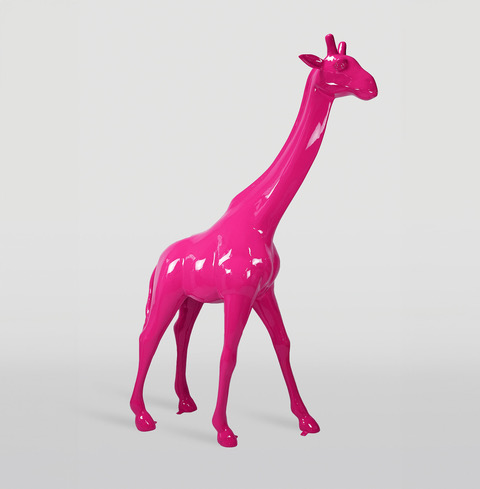 Pink giraffe statue on a plain background.