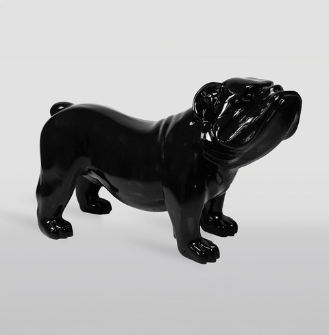 Black ceramic bulldog sculpture.