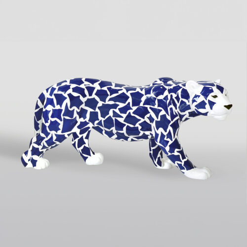 Sculpture of a walking panther patterned with blue and white geometric shapes.
