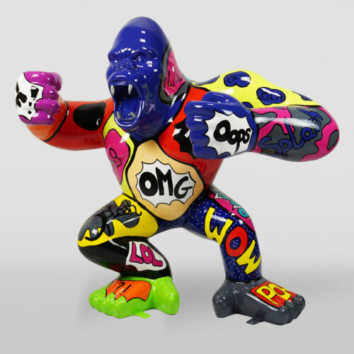 Sculpture of a gorilla brightly painted with a variety of pop art style graphics and comic book exclamations such as 