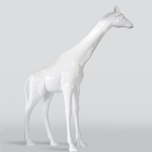 White porcelain giraffe sculpture on a gray background.