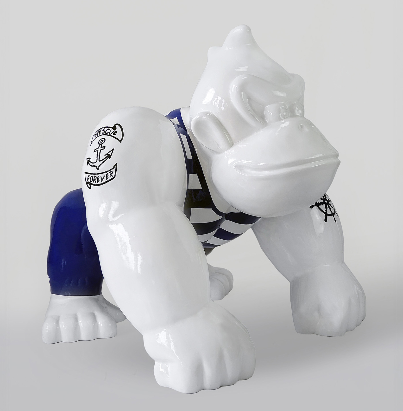 Donkey Kong - Red Sailor 2 White ceramic gorilla figure with navy blue pants and striped shirt, featuring nautical tattoos on its arms.