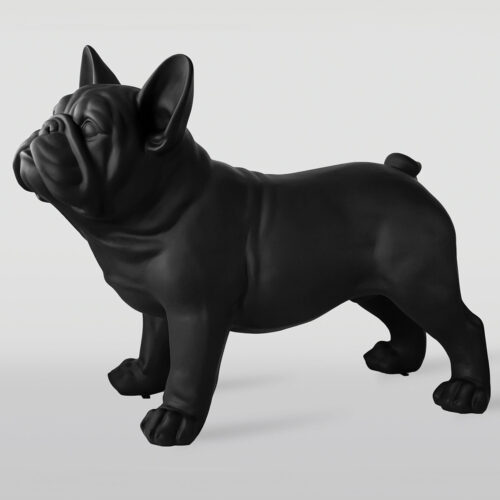 A black bulldog figurine standing on all fours.