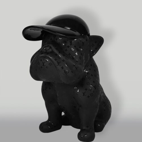 Black bulldog figurine wearing a black cap with embossed luxury brand patterns.