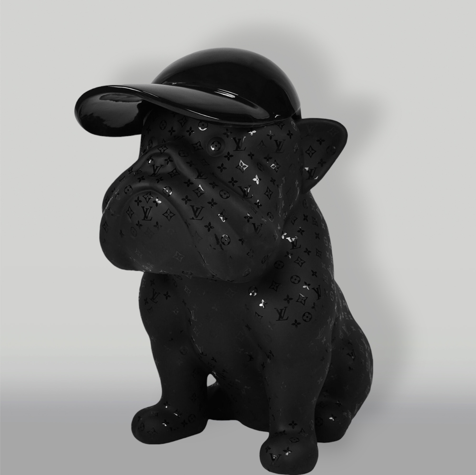 Dog Bulldog with Cap - Matte 1 Black bulldog figurine wearing a black cap with embossed luxury brand patterns.