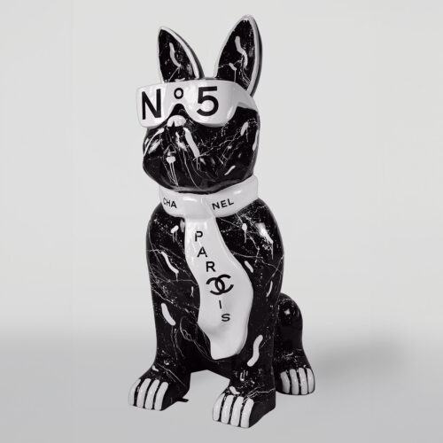 A black and white sculpture of a dog wearing sunglasses with 