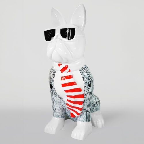 Statue of a bulldog wearing sunglasses, a checkered suit, and a red and white striped tie.