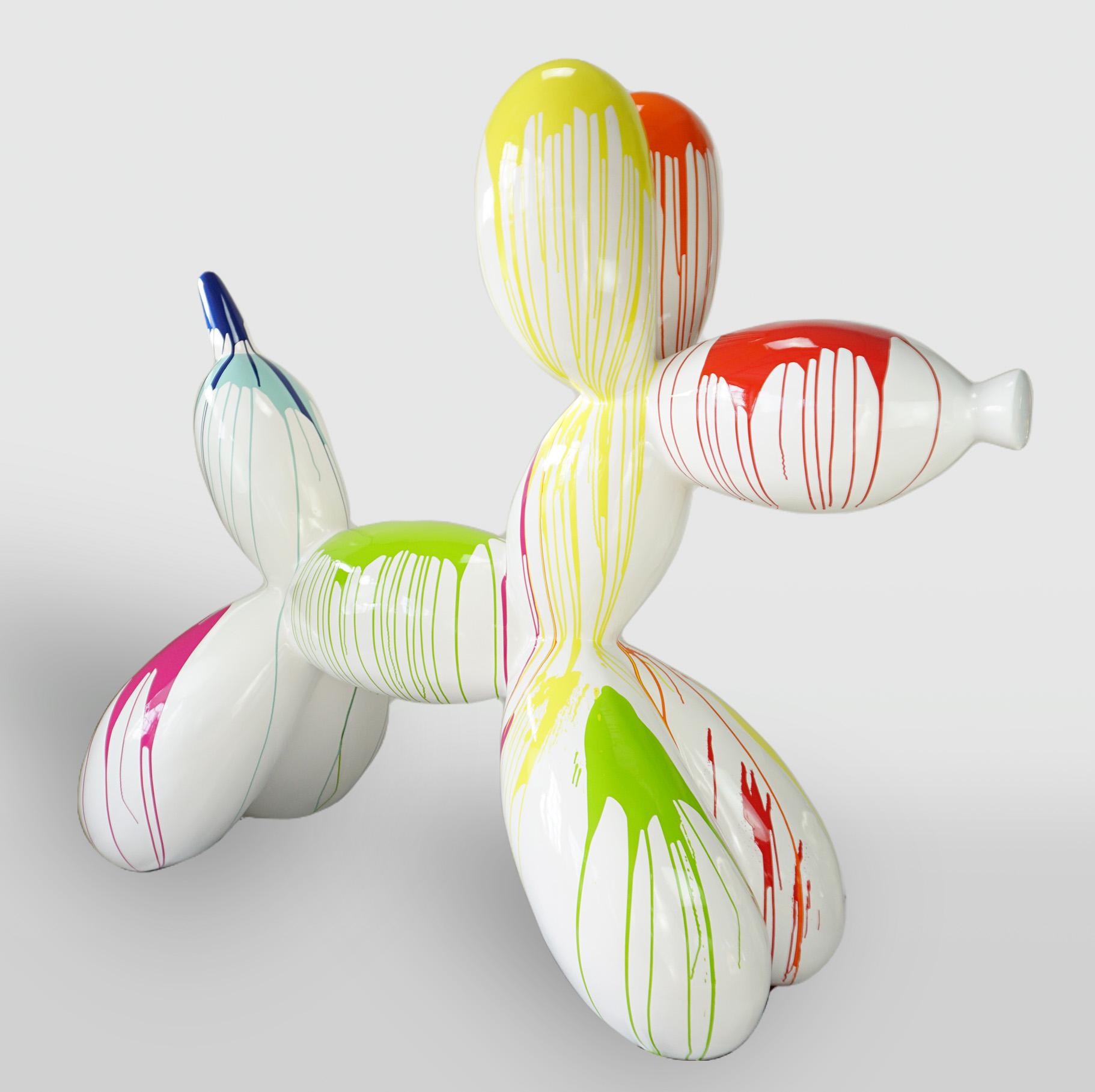 Balloon Dog - Large Decorative Figure - White Trash 1 White balloon dog sculpture with colorful paint drips in yellow, green, blue, pink, and red.