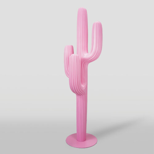 Pink sculptural cactus with a smooth, glossy finish and a round base against a plain background.