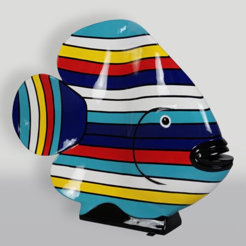 Colorful striped fish sculpture with black eyes on a gray background.