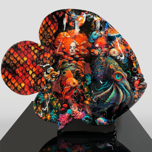 Colorful sculpture shaped like a fish, decorated with intricate and vibrant oceanic scenes, including a woman's face, fish, coral, an octopus, and bright orange scales.