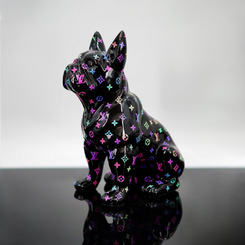 Black ceramic dog figurine with a multicolored Louis Vuitton pattern.