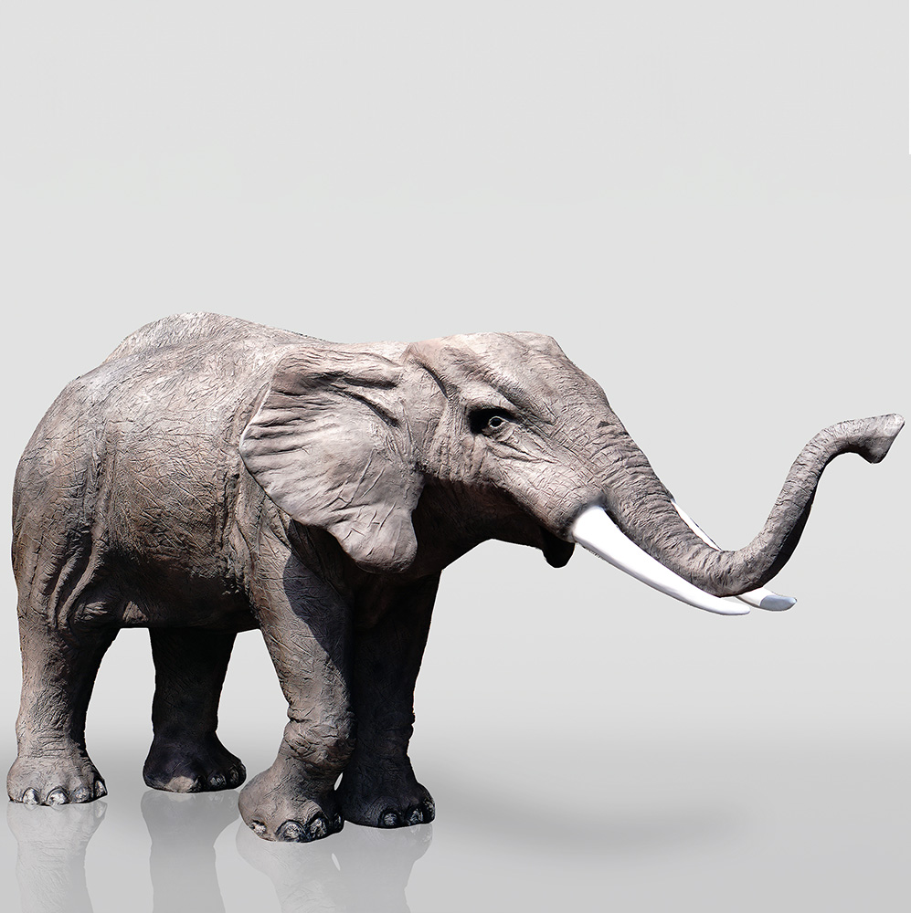 3D Figure - Life-Size Elephant 3 African elephant with large tusks and raised trunk on a light background.