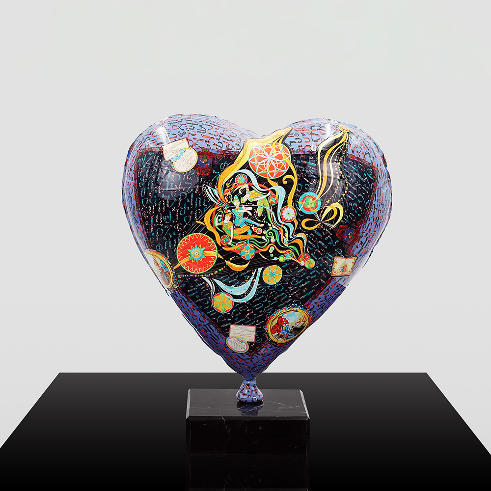 Decorative Heart-Shaped Balloon Figurine 6 Colorful heart-shaped sculpture with intricate abstract designs and circular patterns, mounted on a black square base against a plain light background