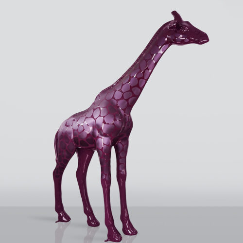 Glossy purple sculpture of a giraffe with darker purple spots standing on a reflective surface against a light grey background