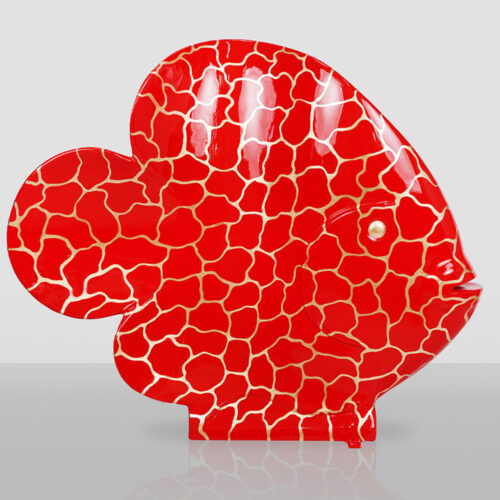 Glossy red ceramic fish sculpture with a pattern of irregular beige lines resembling cracks, featuring a pearl-like eye, displayed against a light gray background with its reflection below.